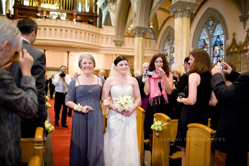 Catholic church wedding - mother walking bride down aisle