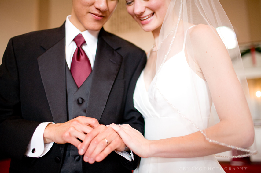 Winter wedding in Boston, MA - bride and groom showing rings