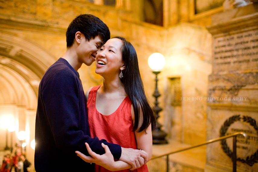 Indoor Boston engagement session - Couple laughing in library