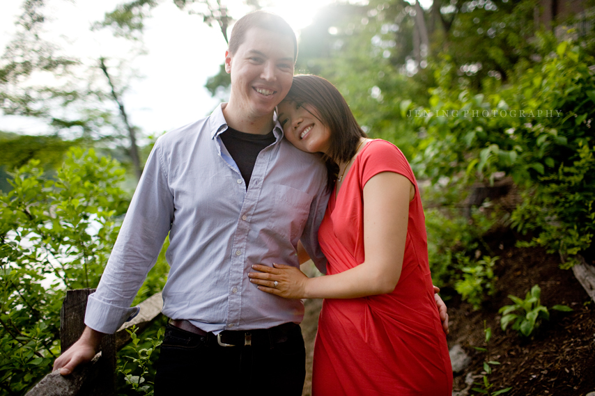 Green engagement shoot at Wellesley, MA - couple smiling in sun