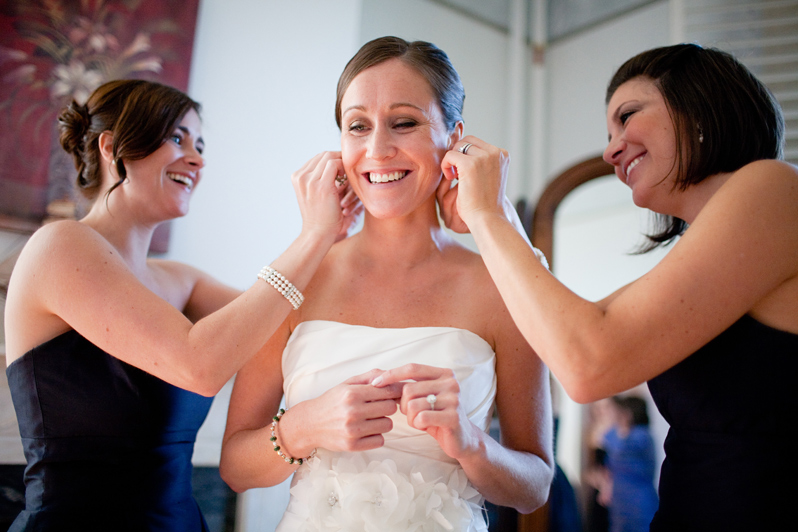 Boston wedding at Commandant's House - bridesmaids help bride get ready